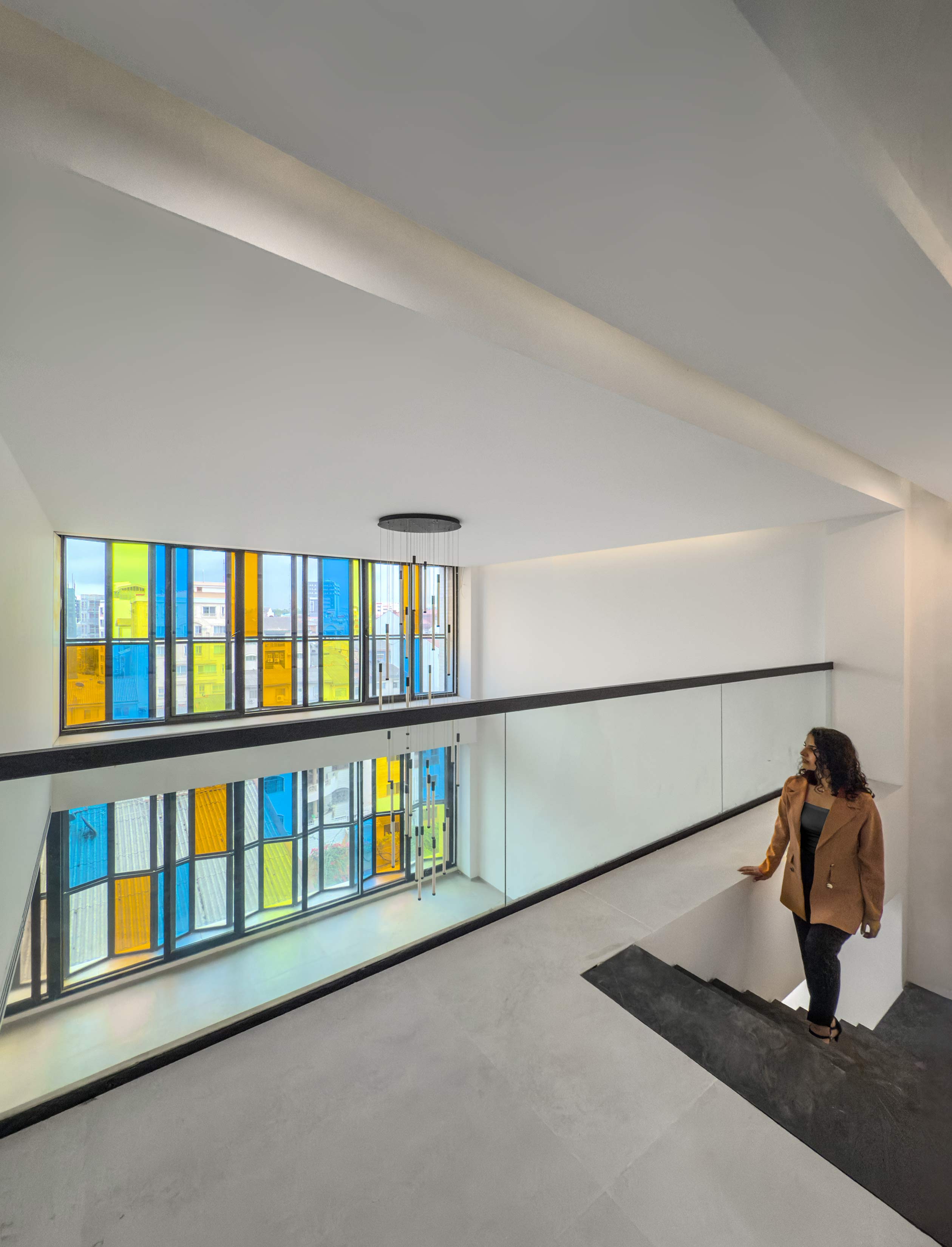main window of the living room, stairs of the duplex Penthouse, Penthouse at the Jameh-Chin (Pleated Veil) Apartment