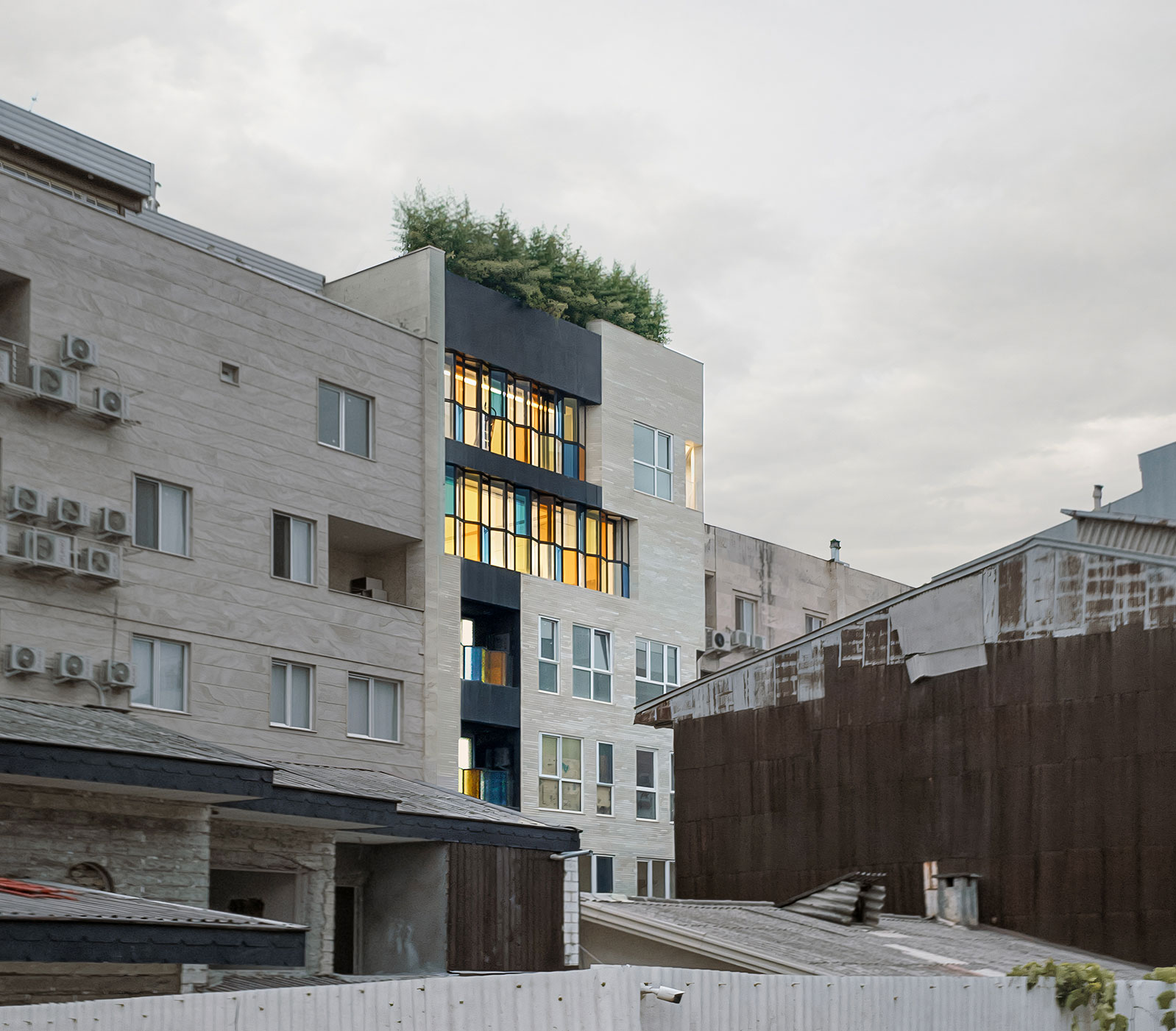 southern facade, far view, the Jameh-Chin (Pleated Veil) Apartment,100 St, Rasht, Iran