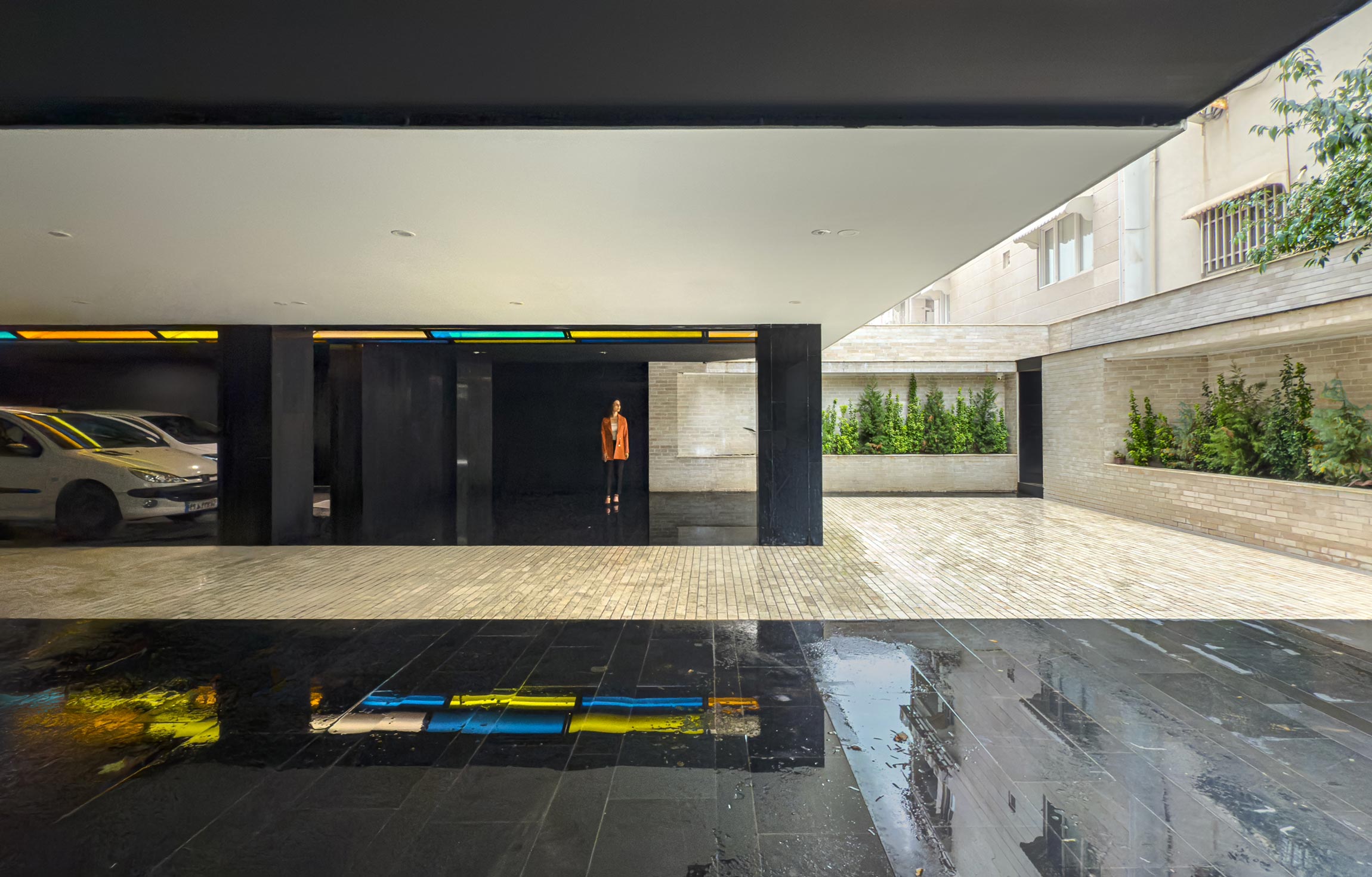 the yard and the parking lot, the Jameh-Chin (Pleated Veil) Apartment,100 St, Rasht, Iran