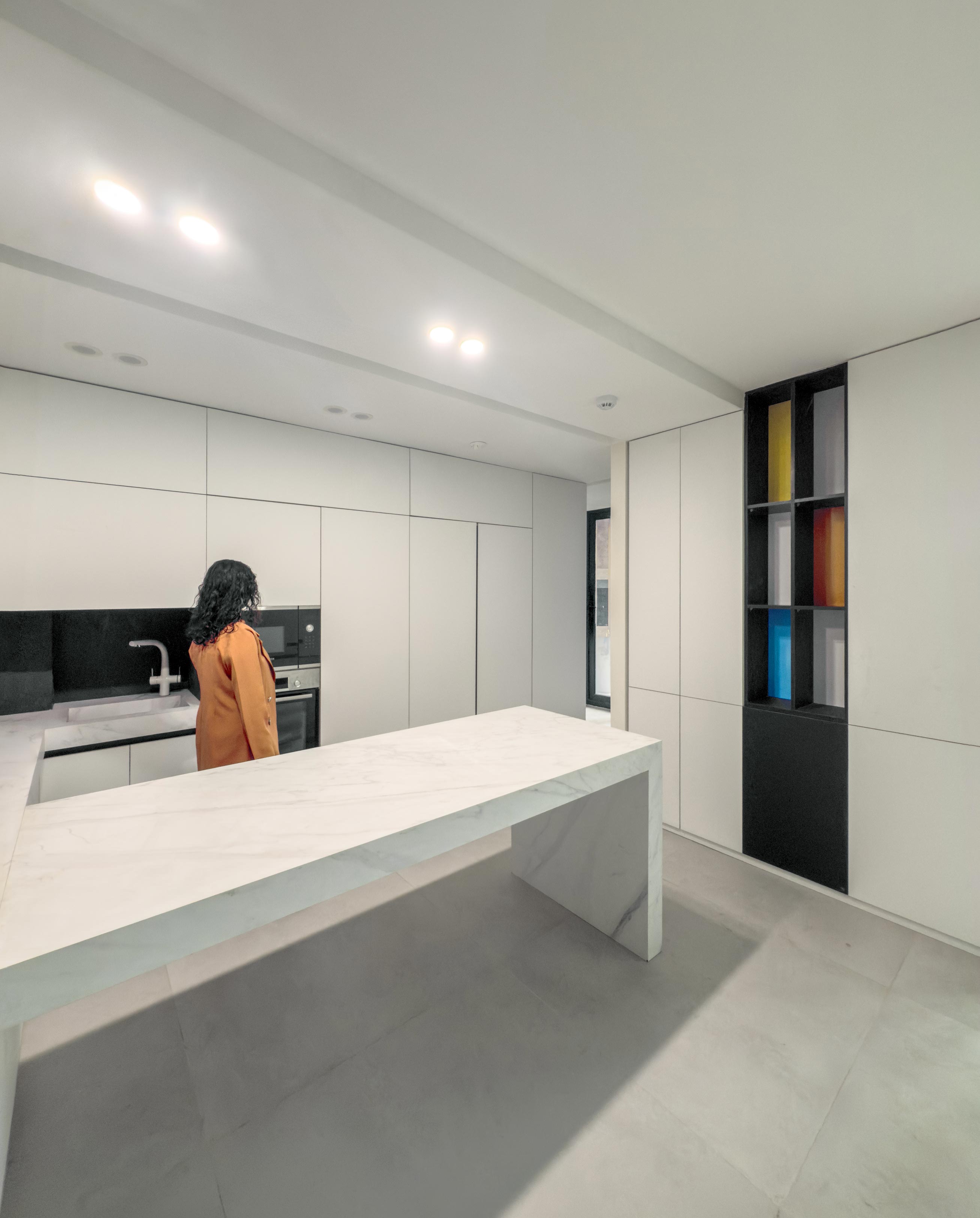 the kitchen and its counter, the 1st and 2nd floor, the Jameh-Chin (Pleated Veil) Apartment,100 St, Rasht, Iran