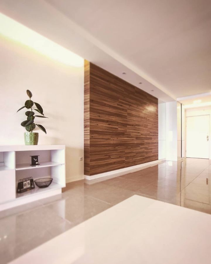 wooden wall, renovation of a unit in tavoos tower