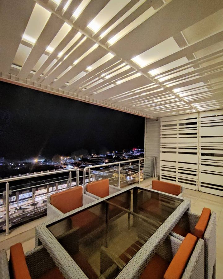 balcony at night, renovation of a unit in tavoos tower